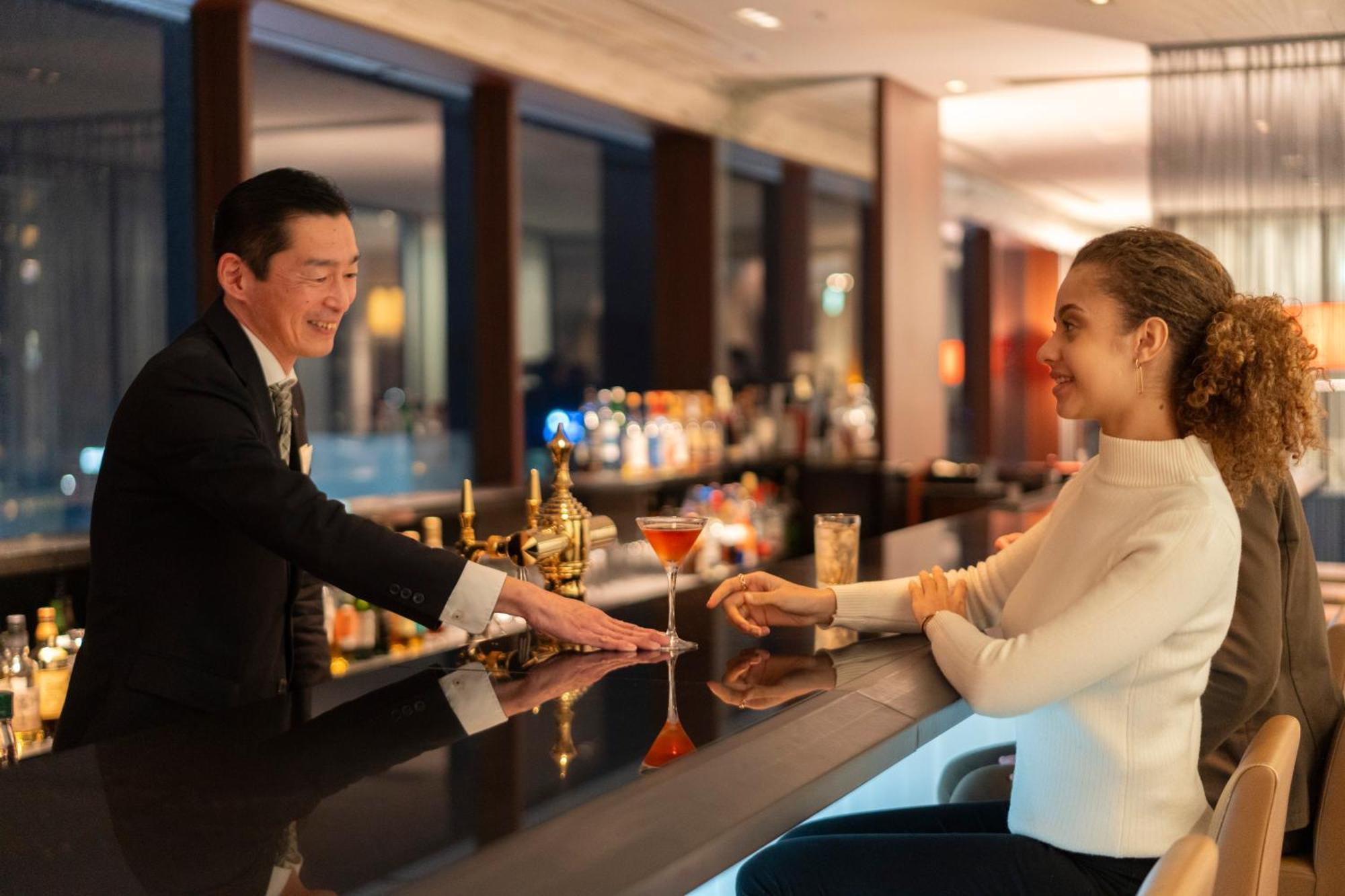 Hotel Associa Shizuoka Exterior photo A bartender serving a guest